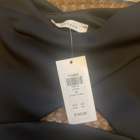 black mini dress with front and back cutouts. - Picture 2 of 5